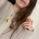 Locket ~ Beneath My Bones / Round