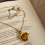 Locket ~ Beneath My Bones / Round
